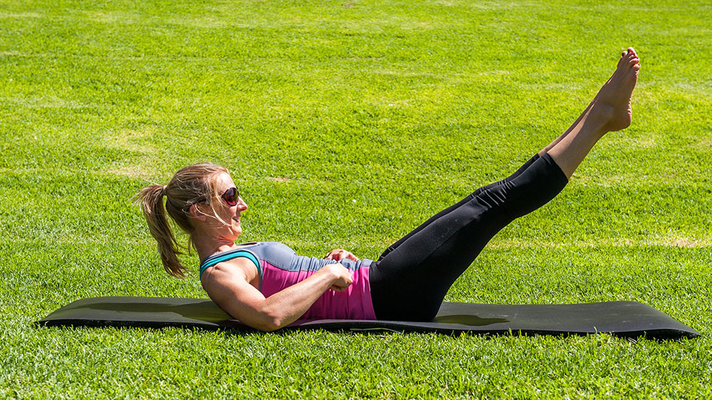Pilates Double leg stretch with pelvic floor and transverse abdominis working properly.